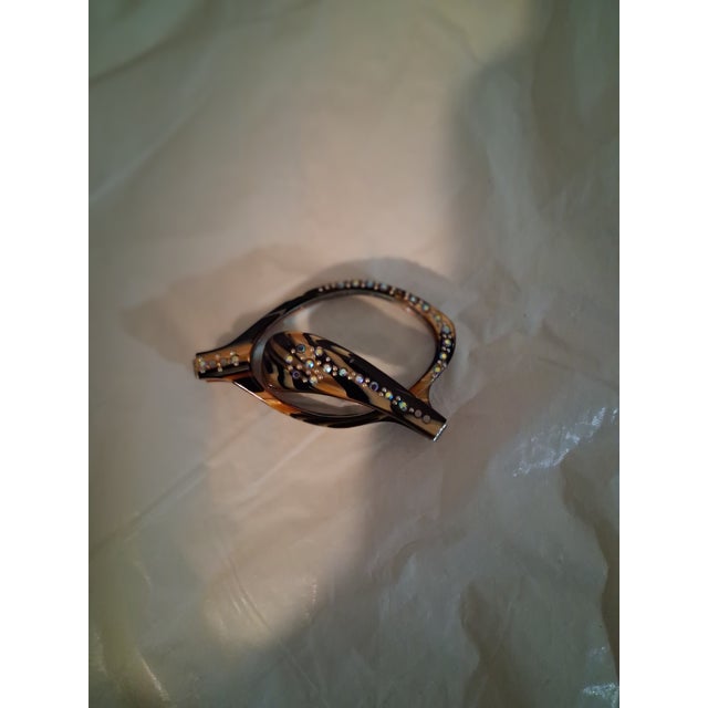 Folding glasses/Lorgnettes. Turtle shell color with rhinestones around outer edge.
