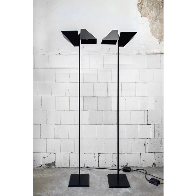 Pair of two-light, adjustable lamps in lacquered metal. Manufacturer: Contact 1980s This piece has an attribution mark, I...