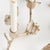 Made from handsculpted molds in solid cast aluminum, these natureinspired branch and leaves taper holders in champagneGold...