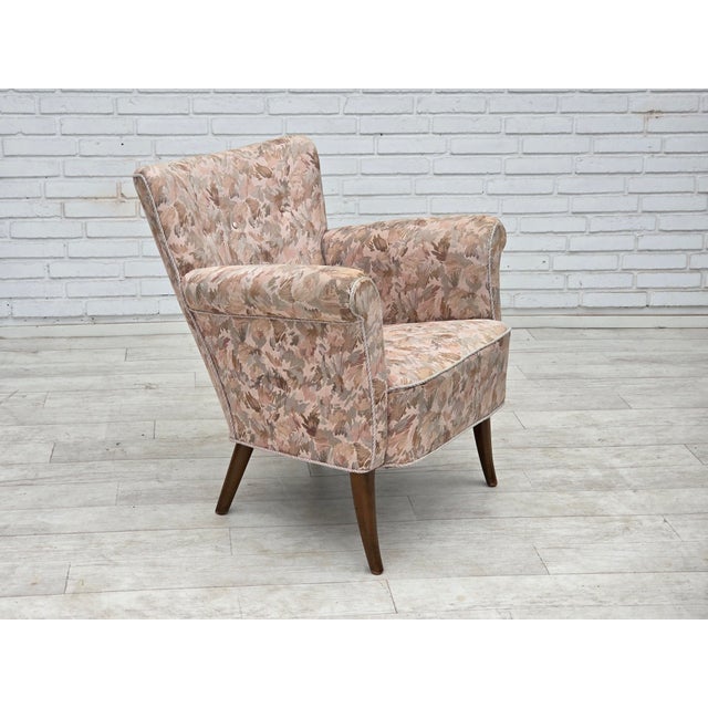 1960s, Danish armchair. Furniture jacquard fabric, beech wood legs, springs in the seat. Original good condition: no...