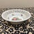 This elegant vintage reticulated porcelain bowl is a classic piece of German craftsmanship, likely from Schumann Bavaria....