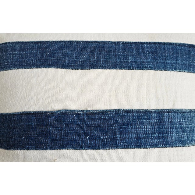 Beautiful vintage Indigo Mali striped mud cloth tribal textile pillow. Each of these vintage textiles is hand crafted and...