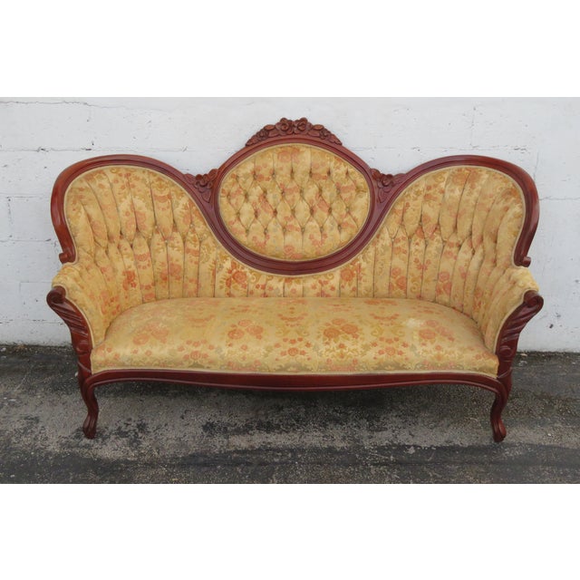 This exquisite Sofa is made out of wood, solid mahogany, and upholstery. The Sofa was made by Kimball, and it has a...