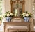A classic pairing of blue and white porcelain planters, rendered in a softly faceted, scalloped form that feels both...