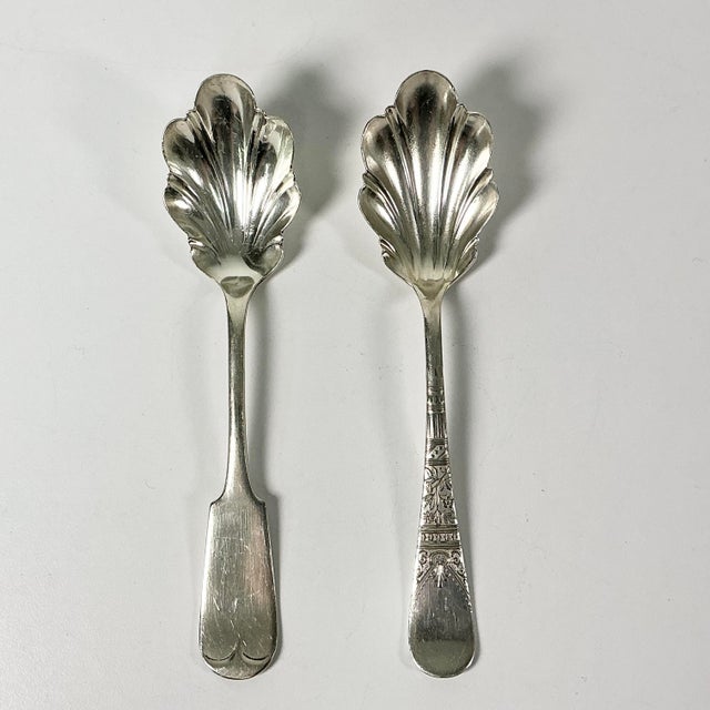 This pair of Serving Spoons are chic and gorgeous. They are from the Early 1900s and feature a Shell-Fan Scalloped spoon...