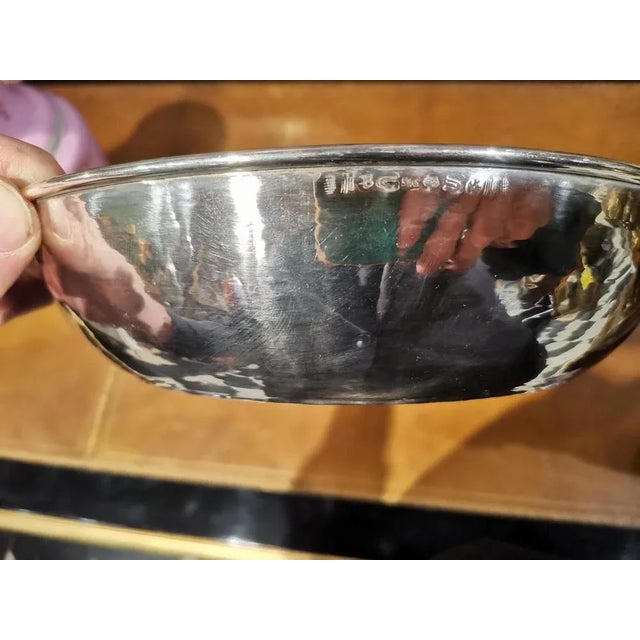 Silver tray with embedded silver coins. European work from the late 19th century. Measures: 30 x 25 x 8 cm. This piece is...