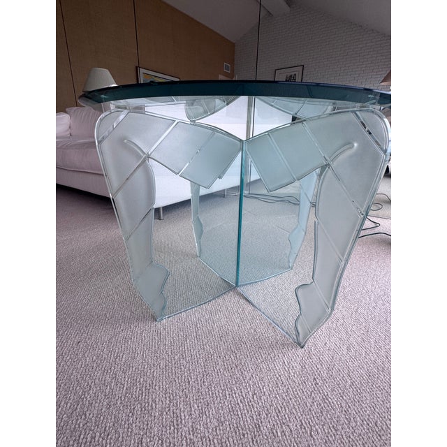 A striking pair of signed and numbered sculptural glass side tables attributed to Italy, circa 1980s–1990s. Each table...