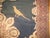 A long gallery size Karabagh rug with a pictorial piegoen design on a dark navy field. 7'2'' x 21'5''