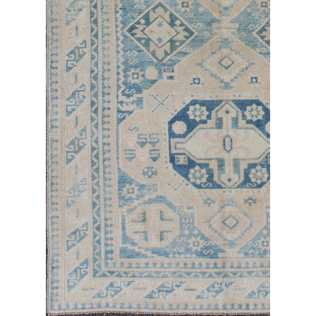Blue and tan vintage Turkish Oushak rug with geometric dual medallions, rug tu-mtu-136618, country of origin / type:...