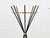 This Italian umbrella stand from the 1950s boasts a striking, sculptural form strongly reminiscent of Mid-Century Modern...