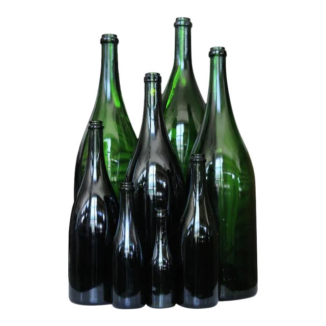 Set of Eight Vintage French Champagne Bottles For Sale