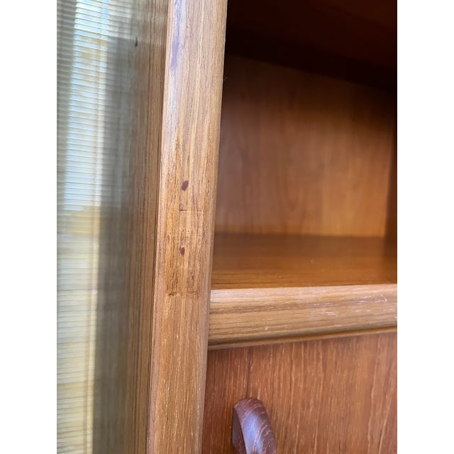 A Pair of Vintage Single-Column Danish Teak Bookcases With Cabinet Storage. Circa 1970s For Sale - Image 10 of 17