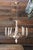 A striking monumental Italian eight-light chandelier dating to the 1940s, beautifully combining carved and painted wood...