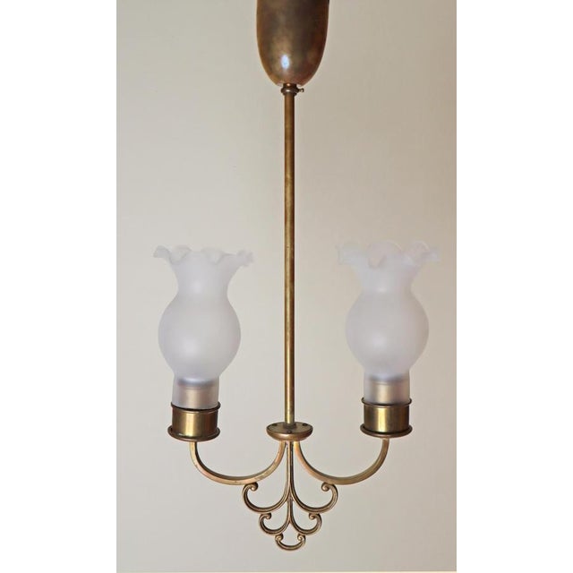 This beautiful, simple hanging lamp was made in the 1920s, and it's a truly unique piece. Its design is simple and...