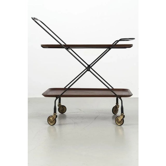 Beautiful bar trolley with a leather handle designed in the 1960s by the swedish designer paul nagel and produced by jie...