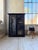 Antique 1900s bookcase in blackened rattan/bamboo with three glass sides. this display cabinet possesses a certain...