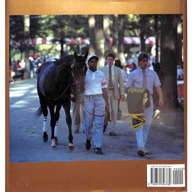 PARKER, Robert B and Joan H. [text by] [175] pp. Viking 1990 10 3/4" x 10 1/8" A Year At The Races is a 1990 non-fiction...