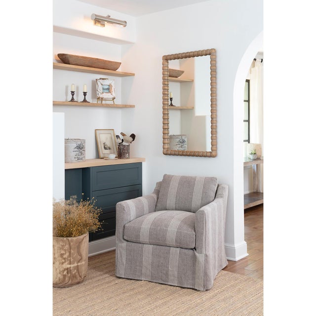 The Perennial Mirror makes an eye-catching statement, mixing an angular silhouette with organic trim. The frame is crafted...