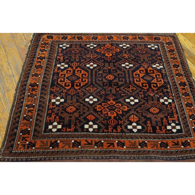 Late 19th Century N.E. Persian Bag-Face Carpet 2'7" x 2'8" Antique Baluch Persian Knotted Rug, Circa Date: 1890s. This...