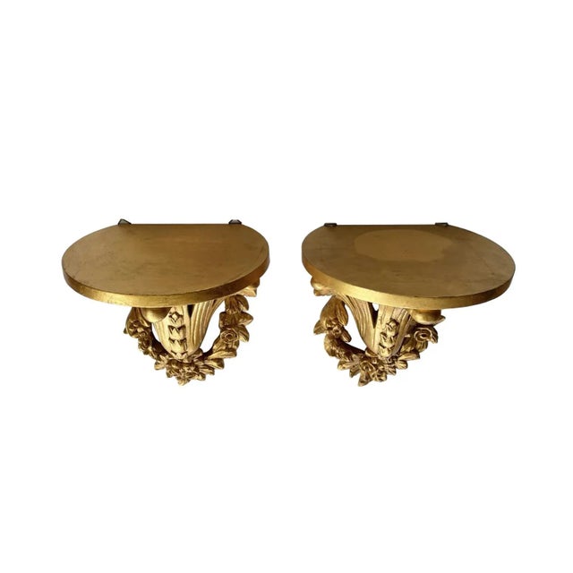 A vintage pair of show-stopping giltwood wall sconces, classically detailed with garlands and bellflowers. Wowza!