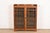 A beautiful Mission or Arts & Crafts period glass front double bookcase cabinet In the manner of Stickley Brothers USA,...