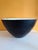 Vintage Danish mid-century modern Krenit bowl with matte black exterior and white enamel interior. Designed by Herbert...