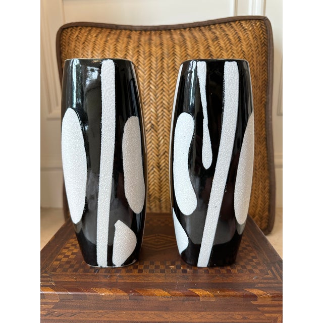 Fabulous Pair of Modernist Black and White Ceramic Vases, Made in Japan. White textured lava-like abstract shapes on bases...