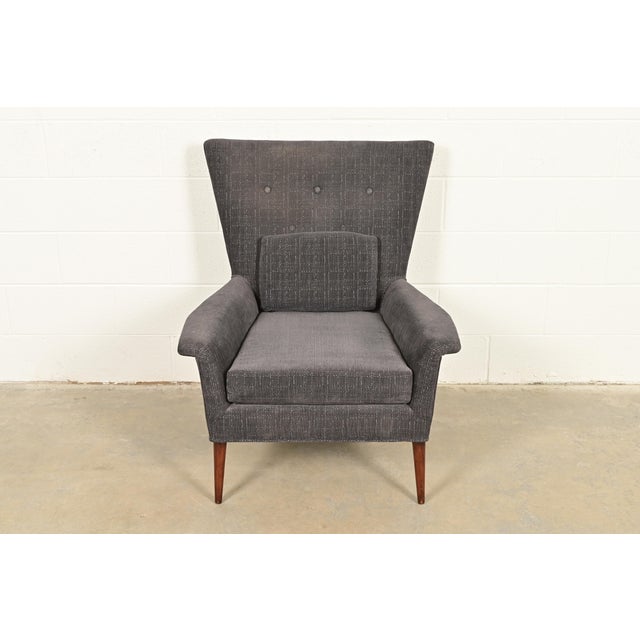 An outstanding Mid-Century Modern wingback lounge chair By Paul McCobb for Custom Craft Furniture, "Planner Group" USA,...