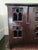 Late 20th century reproduction of a 15th century style gothic aumbry cupboard. Features an oversailing top above a single...