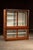 Industrial Early 20th Century Oak Display Cabinet With White Interior For Sale - Image 3 of 15
