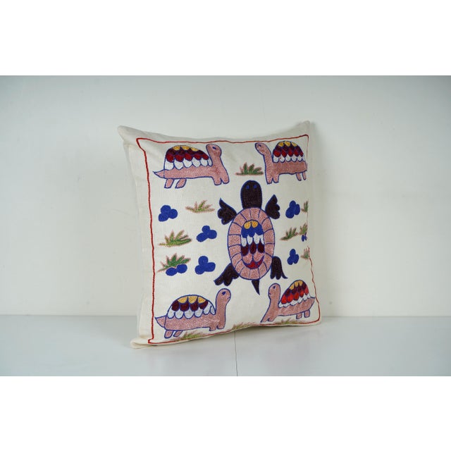 Uzbek Suzani Pillow Cover Elevate your home decor with our Turkish Suzani Pillow Cover, featuring exquisite vintage Uzbek...