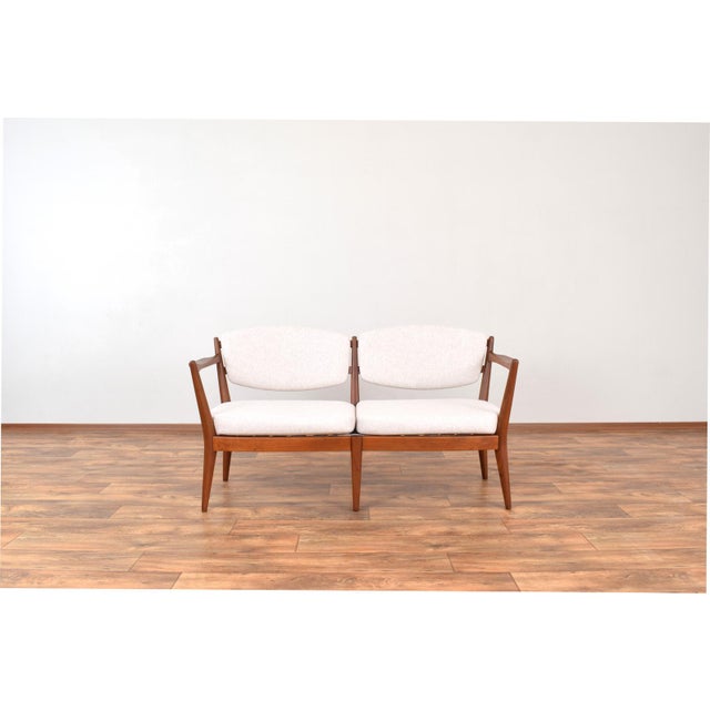 This sofa model "Kaminstolen" was designed in the 1950s by a couple of Norwegian designers Fredrik Kayser & Adolf Relling...