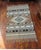 Infuse your space with warmth and heritage using this striking, Zapotec Southwestern style 100 % wool woven rug. Featuring...
