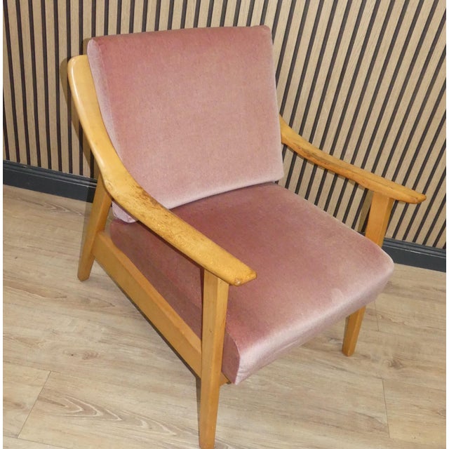 1950s and 1960s Armchair Easy Chair A design classic from the 1950s and 1960s in an extremely elegant design Light wood,...