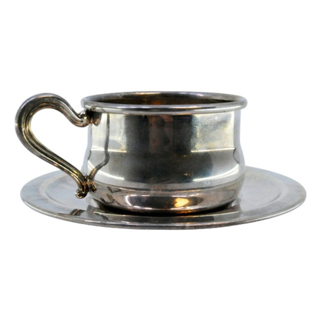 Cup and Saucer in Plain Silver with Embossed Handle For Sale