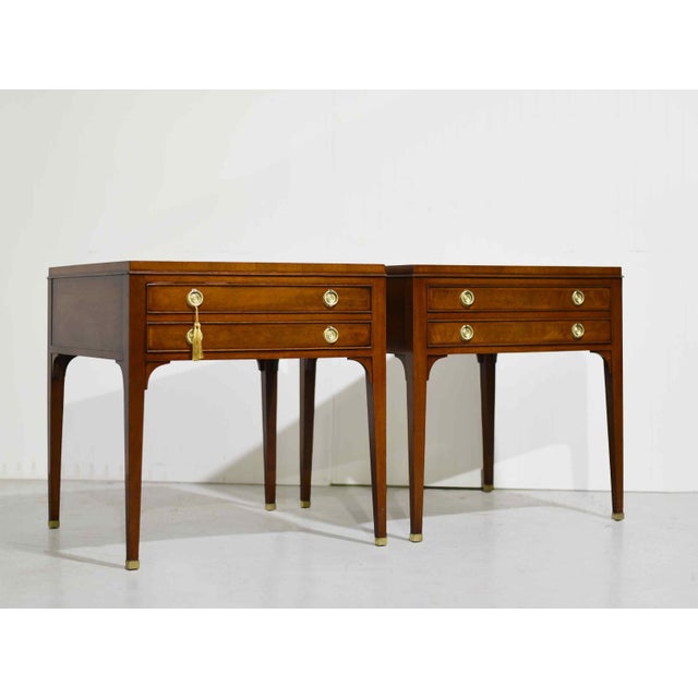 Classic French elegance meets timeless craftsmanship in this pair of Heritage Henredon side tables inspired by the...