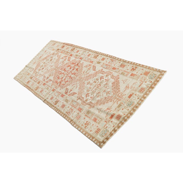 Serab is located on the edge of the Heriz weaving area and specializes in runners. The patterns are mostly geometric, the...