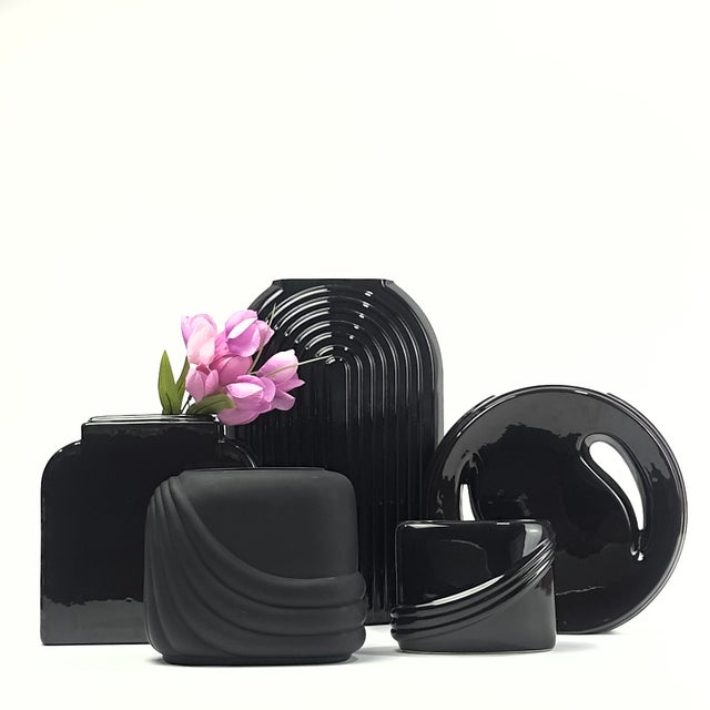Bring 1980s Postmodern Elegance to Your Space Add a bold touch of high-contrast sophistication to your home with this...