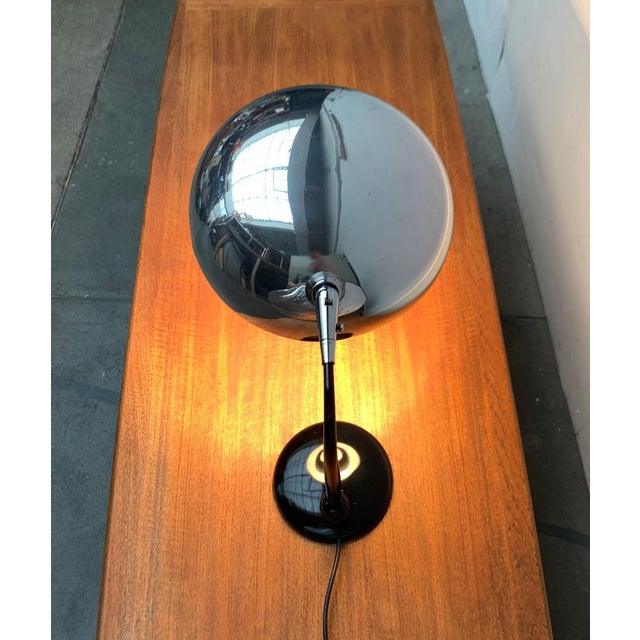 Italian mid-century table lamp. A functional design that convinces with its simple elegance. All elements are rounded,...