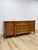 This handsome vintage Drexel transitional MCM nine drawer dresser is a beautifully crafted and highly collectible American...