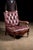 c. 1980s; (likely) Hancock and Moore, Inc. - Hickory, NC Vintage leather armchair and ottoman set with hidden drawer. This...