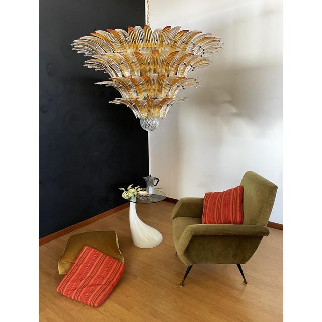 Palmette ceiling light made by 163 Murano amber and trasparent glasses in a gold metal frame. Murano blown glass in a...