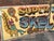 1970’s Circus Fairground Helter Skelter Painted Wooden Sign. Comes in two parts. Sizes:- 386 cms long, 107cms high In...