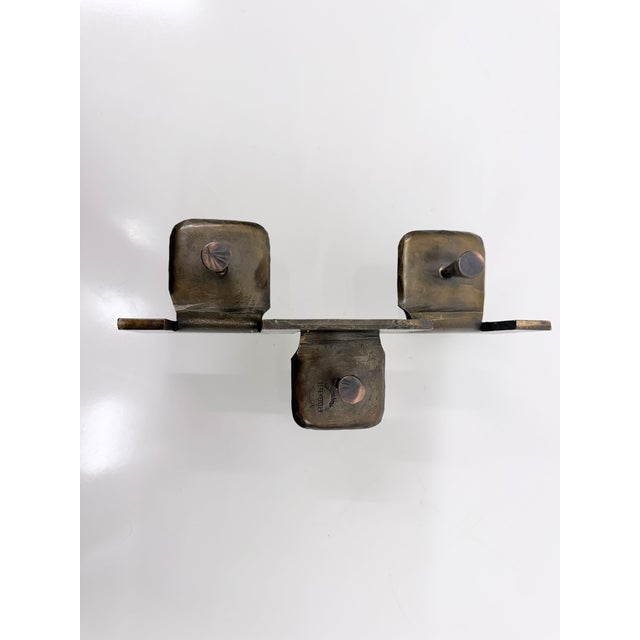 Triple candlestick from the 1970s, designed by Manfred Bergmeister for the Bergmeister metalworking company. Hallmark on...