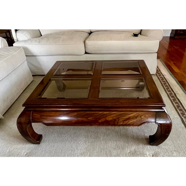 Asian inspired walnut geometric designed table with four panes of glass. The maker is likely Bernhardt though that can’t...