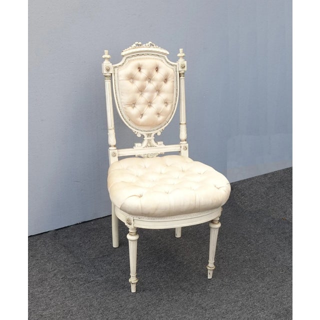 Gorgeous Chair in Good Vintage Condition. The fabric does have some stains. The frame is sturdy. There is wear that is...