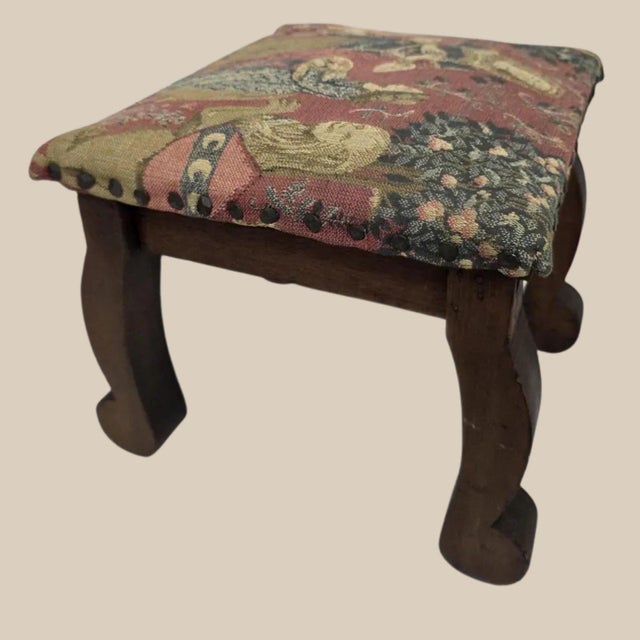 This authentic 1940s Jacobean Revival tapestry footstool brings heritage charm and quiet luxury to reading nooks, hearths,...