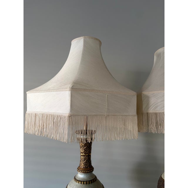 Add instant drama and maximalist style to your interior with this magnificent pair of vintage 1970s Hollywood Regency /...