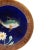 A Joseph Holdcroft Majolica Plate, the center with a relief-molded fish and floral on a deep cobalt blue ground, with a...