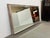 Design Plus Gallery presents a Wall Mirror with Bead Trim in an Antiqued Silver Tone. The mirror is wide and expansive,...